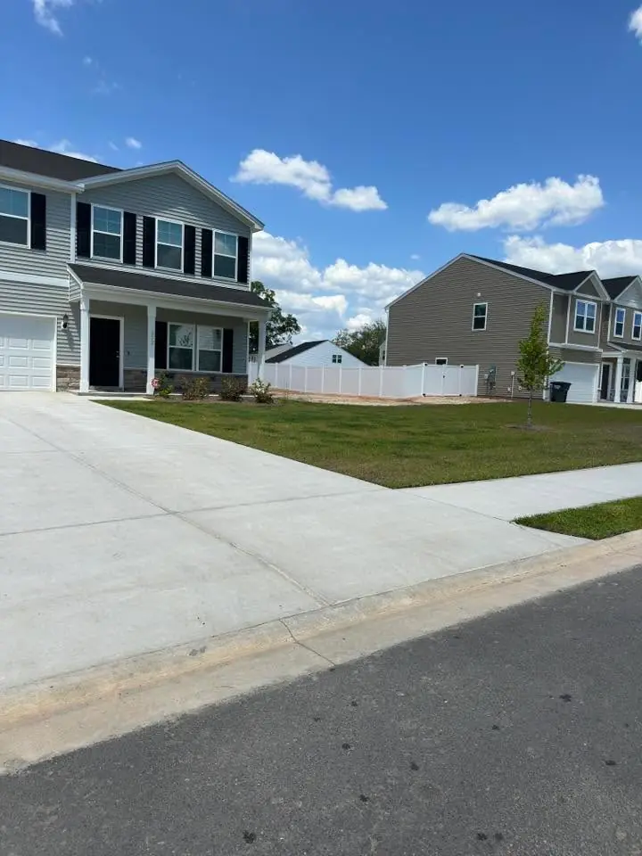 Front lawn and driveway from a Platinum Lawncare project